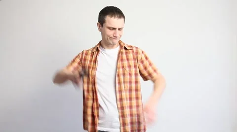 Young man throwing away an empty purse Stock Footage 60408212