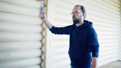 Young man throws sapper shovels at the target Stock Footage 81922548