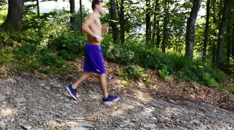 Young man training running in mountains Stock Footage 55865959