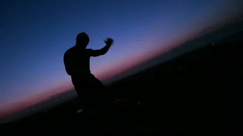 Young Man training in the sunset Stockbeeldmateriaal 813129