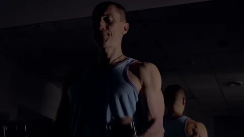 A young man is training. Training in the gym Stock Footage 84675060