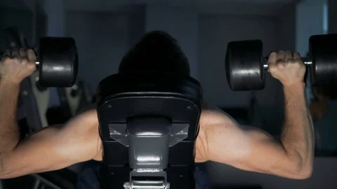 A young man is training. Training in the gym Stock Footage 84678402