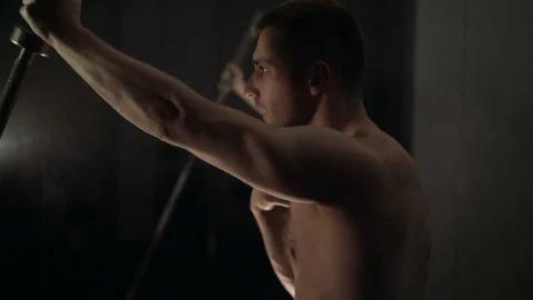 A young man is training. Training in the gym Stock Footage 84747647