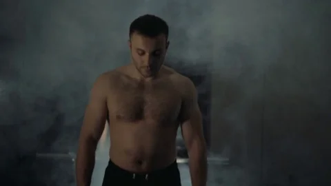 A young man is training. Training in the gym Stock Footage 84748032