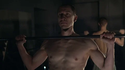 A young man is training. Training in the gym Stock Footage 84748950