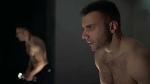 A young man is training. Training in the gym Stock Footage 84749734