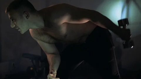 A young man is training. Training in the gym Stock Footage 84751368
