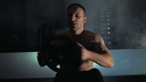 A young man is training. Training in the gym Stock Footage 84755493