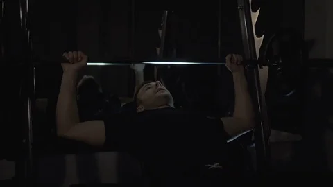 A young man is training. Training in the gym Stock Footage 84759581
