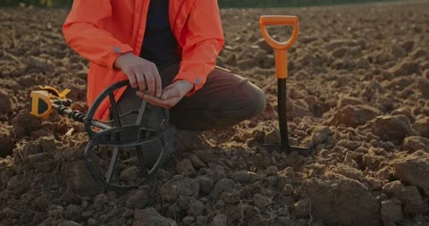 Young man treasure hunter doing archeology in the field. Stock Footage 272319297