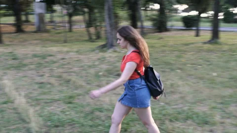 Young man tries to justify himself with his girlfriend who furiously slaps him Stock Footage 136338689