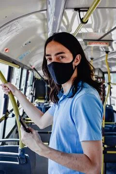 A young man on a trip inside the bus Stock Photos
