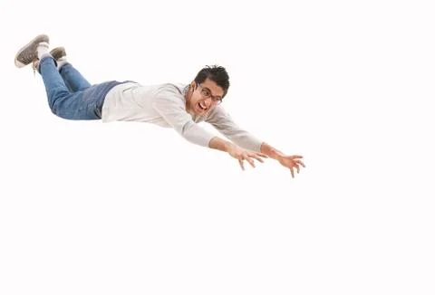 Young man trying to catch Stock Photos
