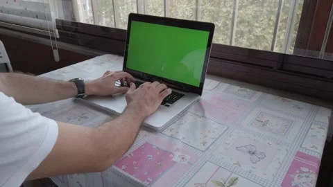 Young man is typing on the computer. Stock Footage