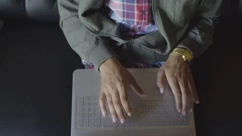 Young Man Typing on Laptop Computer Video stock 208710397