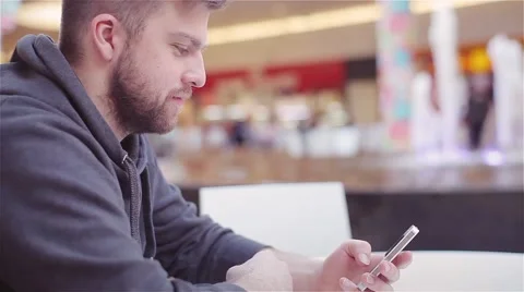 Young Man Typing a Text Message on Your Phone. Stock Footage 47977469