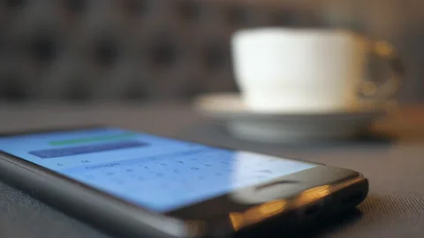 Young man typing text message on cell phone Stock Footage 103449955