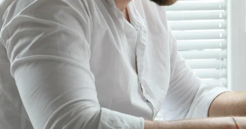 Young man typing thinking and then dreaming Stock Footage 142215182