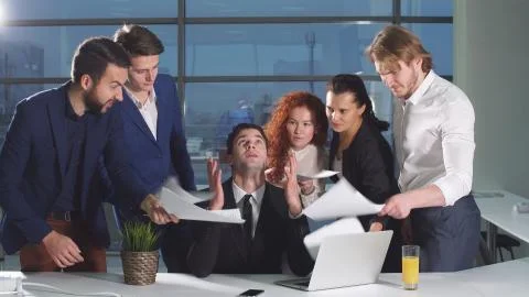 Young man under stress at work. Stock Photos