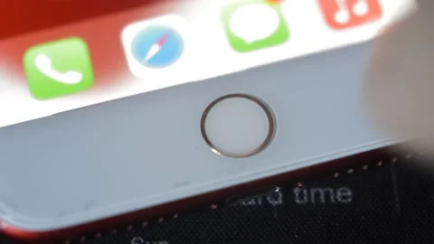 Young man unlock iphone with touch ID fingerprint. touchid identification. Stock Footage 234873367