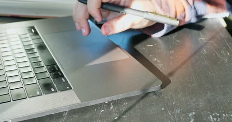 Young man uses laptop to complete school work. Stock Footage 141231253