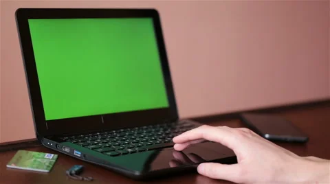 Young man uses a laptop to view the information. Video stock 61741143