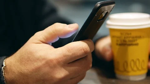 Young Man Uses the Phone Stock Footage 86319290