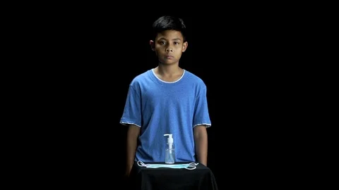 Young man using alcohol rub alternative to washing hands Stock Footage 126883652