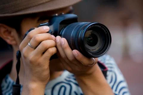 Young man using camera Stock Photos