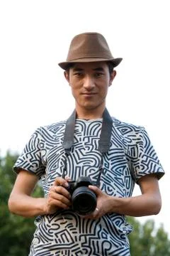 Young man using camera Stock Photos