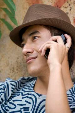 Young man using cell phone Stock Photos