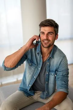 Young man using cellphone for work, social media or relaxation. Smart phone 스톡 사진