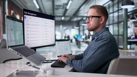 Young Man Using ERP Software On Laptop Stock Footage 331516431