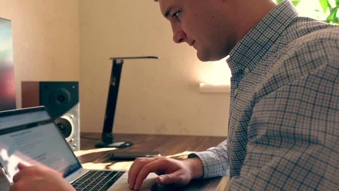 Young man using a Stock Footage 125896420