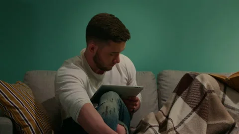 Young Man Is Using Gadget Stock Footage 146465106