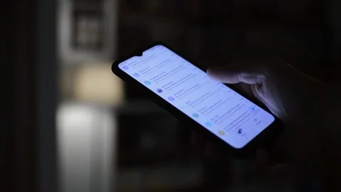 Young man using google email app on his phone. phone e mail dark background Stock-Footage 196090135