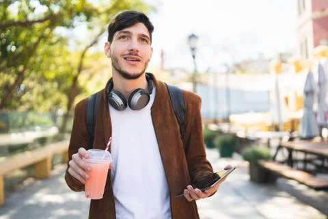 Young man using his digital tablet. Stock Photos