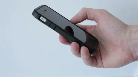 Young man using his iPhone Stock Footage 61518415