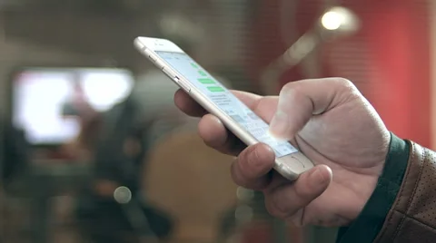 Young man using his iPhone. Stock Footage 62955305