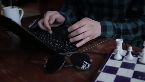 Young man using his laptop Stock Footage 73297176