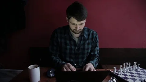 Young man using his laptop Stock Footage 73297178