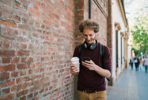 Young man using his mobile phone. Stock-Fotos