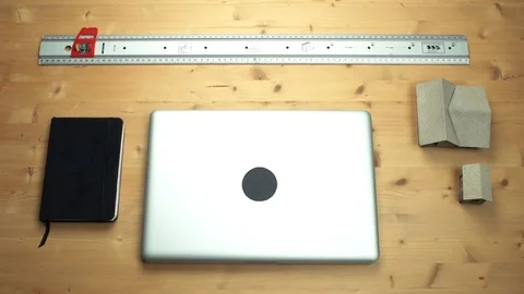 Young man using laptop with green screen at wooden desk. Top view on male hands Stock Footage 82898412