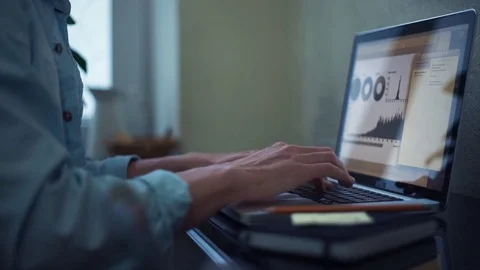 Young man using laptop at home. Freelancer working at home. Stock-Footage 82931616