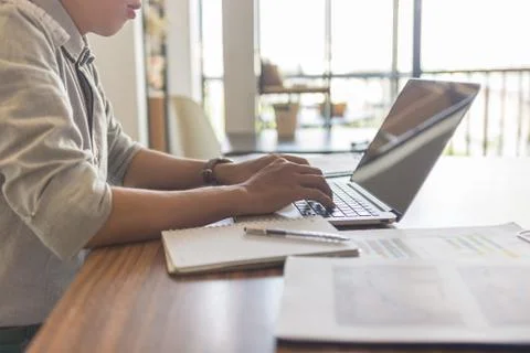 Young man using laptop in the office Foto stock