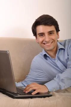 Young man using laptop Stock Photos
