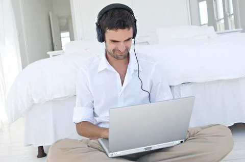 Young man using laptop Stock Photos