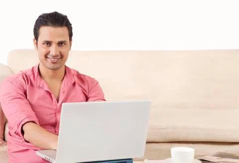 Young man using laptop Stock Photos