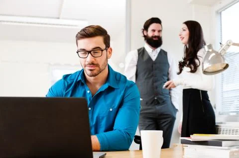Young man using laptop Stock Photos