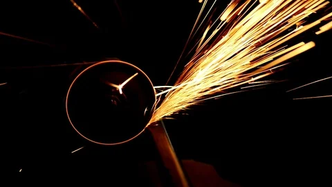 Young Man using a metal grinder. Stock Footage 85677424